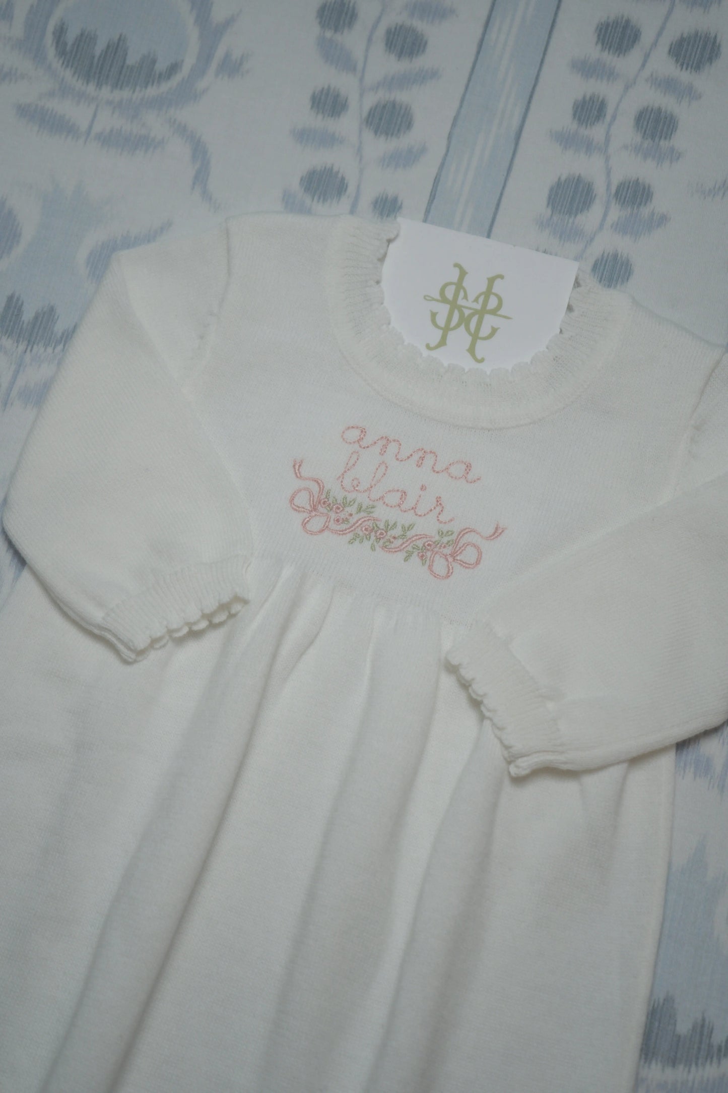 Personalized heirloom scalloped knit gown bundle with custom embroidery for a newborn outfit or baby gift; embroidery detail