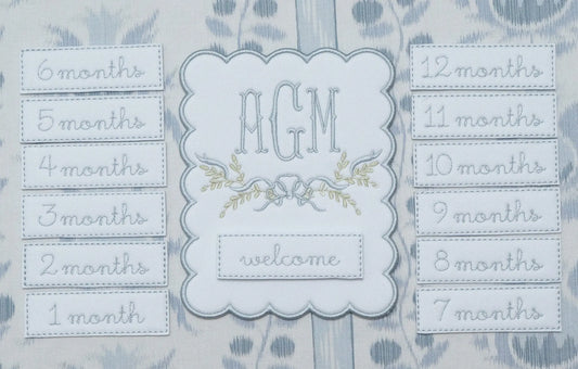 Personalized bennett monthly milestone plaque with embroidered monogram for baby milestone photos; styled view
