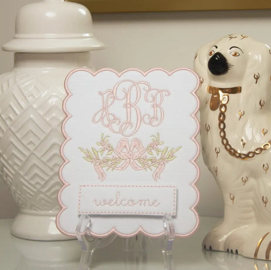 Personalized eloise monthly milestone plaque with embroidered monogram for baby milestone photos; styled view