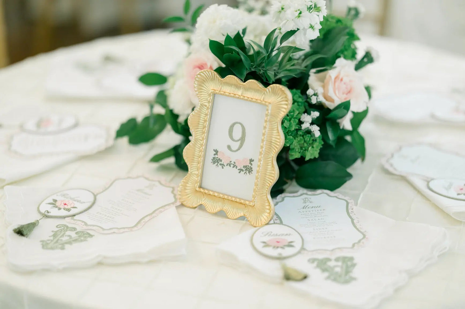 Custom wedding table number with embroidery designed to coordinate with reception décor