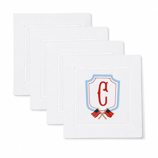Set of americana crest monogram cocktail napkins with personalized embroidery for entertaining