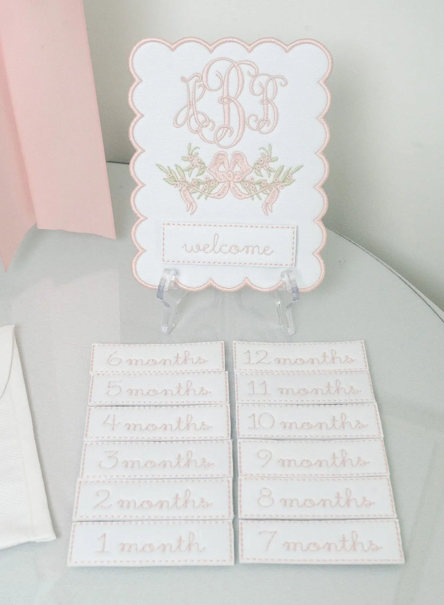 Personalized eloise monthly milestone plaque with embroidered monogram for baby milestone photos; embroidery detail