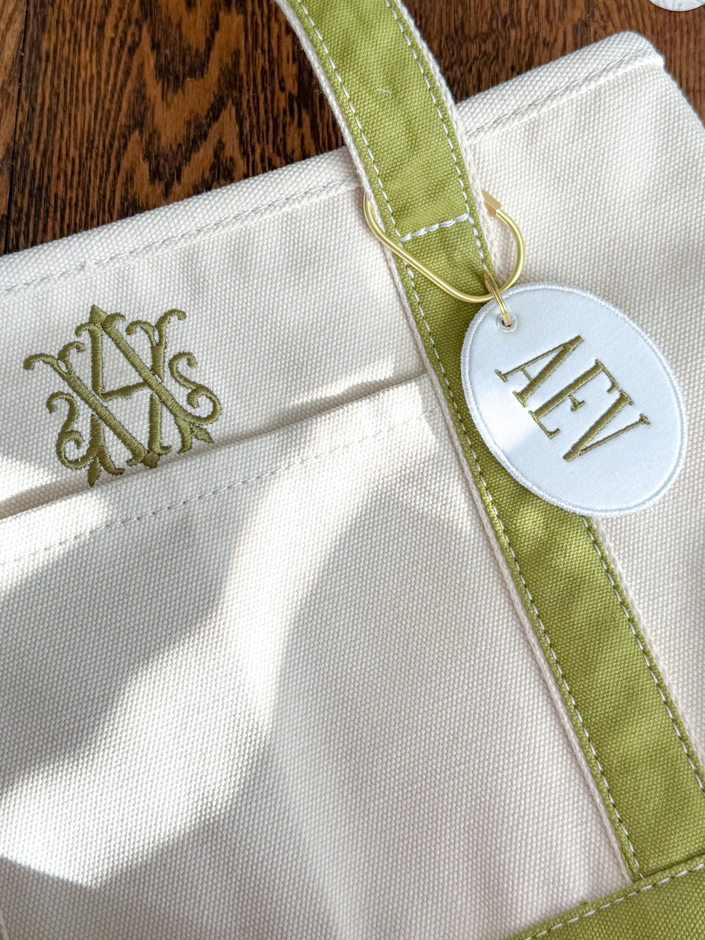 MONOGRAM BAG CHARM KEYCHAIN