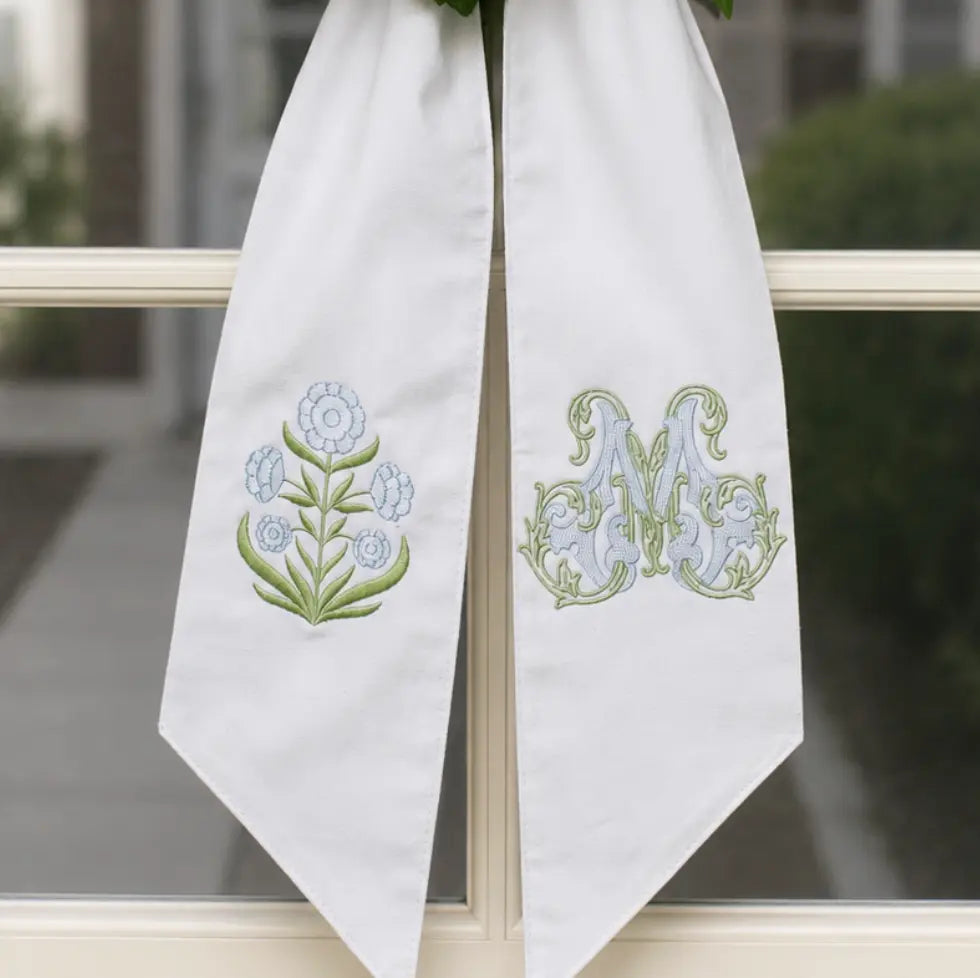 Personalized block print floral wreath sash with embroidered motif for a decorative front door wreath