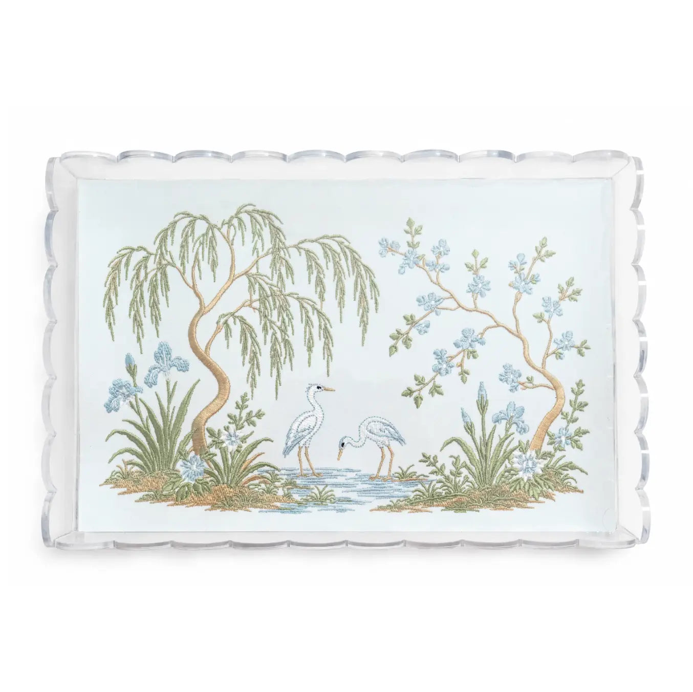 Clear scalloped acrylic tray with embroidered chinoiserie garden scene, two white herons, trees, and blue flowers